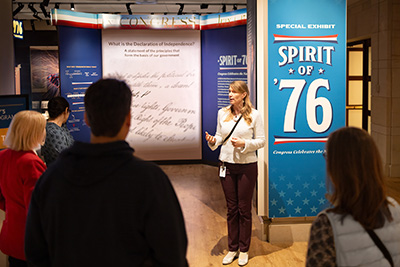 Woman speaking to guests